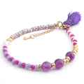 Detailed macro view of purple crystal beaded bracelet with boho tassel and gold lobster clasp - BC170-8 Purple Tassel