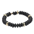 Close-up of black matte disk beads with textured gold metal accents on elastic bracelet - Black
