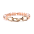 Elastic beaded bracelet with faceted peach pink beads and textured golden metal rings - Peach Pink