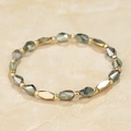 Detailed macro view of gray-green faceted crystal beads and golden metallic accents - Gray Green Style (BC431-7)