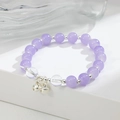 Elegante bracciale con perle lilla traslucide e campanellini d'argento su sfondo bianco - Lilla Chiaro (GBC02-6)