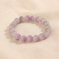 Détail des perles dégradées violettes et grises de 10 mm sur un tissu texturé - Gris Violet (GBC018-5)