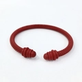 Matte red twisted cable open bangle bracelet with ribbed spherical end caps - Dark Red
