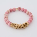 Pink natural stone beaded bracelet with gold metal rings on a light gray background - Pink Textured (BC468-12)