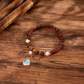 Cat eye bead bracelet with freshwater pearls and clover pendant on wood background - Brown (GBC09-5)