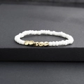 Handmade bracelet with white round beads and irregular golden copper accents on stone - White (BC493-2)
