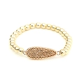 Detailed close-up of a gold beaded bracelet featuring a sparkling druzy teardrop charm - Gold (BC506-5)