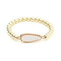 Detailed view of a gold beaded bracelet featuring a sparkling teardrop charm pendant - White (BC506-6)