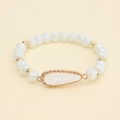 Detailed view of faceted white crystal beads and gold teardrop pendant on the bracelet - White (BC510-1)