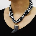 Close-up of leopard print fabric scarf necklace with grey resin horn pendant and gold accents - Gray Leopard Dark Gray Horn Style (NS02-13)