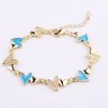 Goldenes Armband mit himmelblauen Emaille-Herzen und Mikro-Zirkonia für Damen - Blaues Herz (BC562-11)