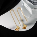 Elegant gold butterfly tassel earrings with matte finish on a mirrored reflective background - 5537 Butterfly Ear Thread / Gold