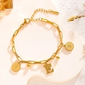Gold titanium steel bracelet featuring coin pendants and a letter E charm for women - Queen Portrait - Letter E (7841)