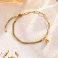 Collana in acciaio al titanio dorato con pendente a sfera su sfondo di pietra bianca - Cavigliera con Perle Tonde (6617)