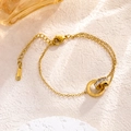 Pulsera de acero de titanio dorado con anillos dobles de números romanos y pavé de cristal - Dorado - Pulsera