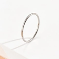 Polished silver stainless steel minimalist band ring for stacking in a high-gloss finish - US Size 7 / Domed Surface / Steel