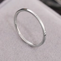 Minimalist polished silver titanium steel ring with a sleek round band design - US Size 7 / Plain Surface / Steel