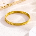 Three-piece gold-toned stainless steel bangles set featuring polished and frosted finishes - No.60 / Gold