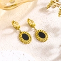 Macro shot of vintage gold-plated oval earrings with black inlay and ball textured edges - Black Shell Earrings (5644) / Gold with Black