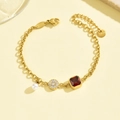Elegant gold titanium steel bracelet with ruby red gemstone and pearl pendant for women - Gold