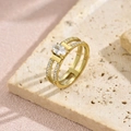 Detail of a gold double-band ring with a large oval zircon and pavé-set stones - Size 7 / Double Ring Oval Zirconia Style (JZ6705) / Gold