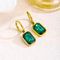 Close-up of gold-plated hoop earrings featuring rectangular emerald green zircon stones - Emerald Green