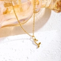 Collana in acciaio al titanio dorato con ciondolo a lettera L corsiva e piccolo cuore - Oro / Lettera S