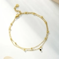 Tobillera de doble capa en acero dorado con pequeñas cuentas y colgante de circón - 14k / Dorado