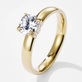 Dettaglio ravvicinato di un anello scintillante con diamante rotondo e montatura a quattro griffe - 10 / Oro