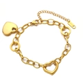 Golden chunky link bracelet with heart charms and 18KGP tag on white background - Gold