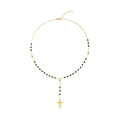 Long beaded cross necklace with black stones and a polished golden tassel pendant - Gold