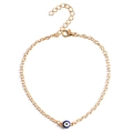 Bracciale occhio turco dorato con catena regolabile e chiusura a moschettone su bianco - Oro