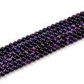 Deep purple tiger eye stone beads with natural silk luster and cat-eye effect on white background - 6mm / Purple