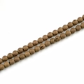 Close-up of 8mm matte natural stone beads with detailed brown mineral texture for DIY jewelry - 8mm / Electroplated Bronze