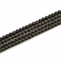 Macro detail of 8mm natural black lava stone beads with porous texture for DIY jewelry - 8mm / Black