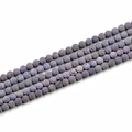 Detailed macro view of 8mm matte purple electroplated lava stone beads for jewelry making - 8mm / Violet