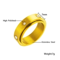 Detail of 7mm gold stainless steel rotatable ring with high polished finish and zircons - US 7 / Starburst Pattern Spinner Style (R167)