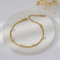 Detail of 18K gold-plated stainless steel snake chain with rectangular cubic zirconia - Bracelet / Gold + White Zirconia
