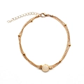 Detail of a double-layered gold anklet with round white gemstone and lobster clasp - Gold Pink Rhinestone