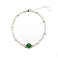 Close-up of double-layer silver anklet with a round green gemstone and lobster clasp detail - Silver With Green Rhinestone