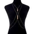 Rose gold multi-layered body chain with round disc pendants on black mannequin - Gold