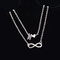 Collana a doppio strato argento con ciondoli cuore, lettera N e simbolo infinito - Stile Lettera N
