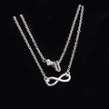 Cavigliera a doppio strato in argento con ciondoli a cuore, lettera U e infinito - Stile Lettera U