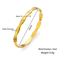 Minimalist 18k gold plated stainless steel wave bracelet with sparkling cubic zirconia stones - Gold