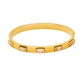 Detailed view of gold plated stainless steel bangle with five rectangular zircon stones - B130-Gold (White Rhinestone)