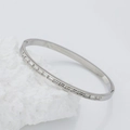 Polished silver stainless steel bangle featuring row of baguette-cut zircons and clasp - B139-Silver (White Rhinestone)