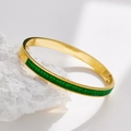 Gold-plated stainless steel bangle featuring emerald green baguette-cut cubic zirconia stones - Gold + Green Rhinestone (B144)