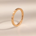 Minimalist 18k rose gold titanium steel ring featuring a single clear zircon stone - US 5 / Rose Gold