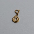 Detailed macro view of a gold-plated Libra zodiac sign pendant with a spring clasp - Libra (With Spring Ring Clasp)