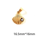 Macro detail of a 16.5mm gold scallop shell pendant with an evil eye charm in stainless steel - Black Shell